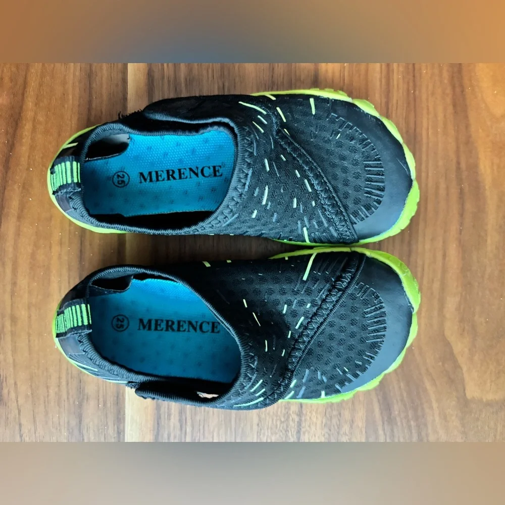 Black and green water shoes